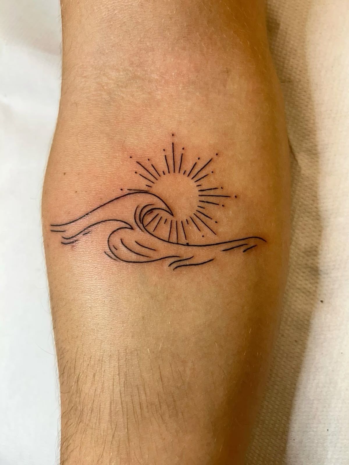 Minimalist Sun and Wave Linework Tattoo Design