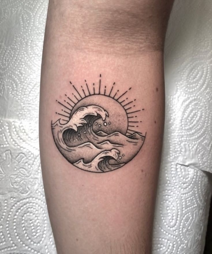 Tiny Circular Wave with Radiating Sun Tattoo Design