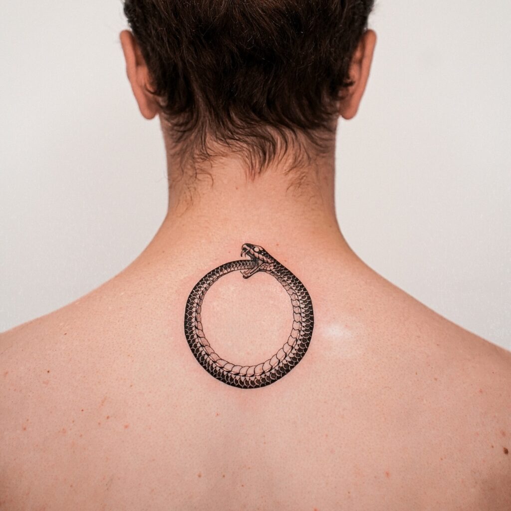 Bold Ouroboros Back Tattoo Tattoo Design