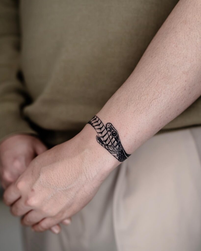 Minimal Ouroboros Wristband Tattoo Tattoo Design
