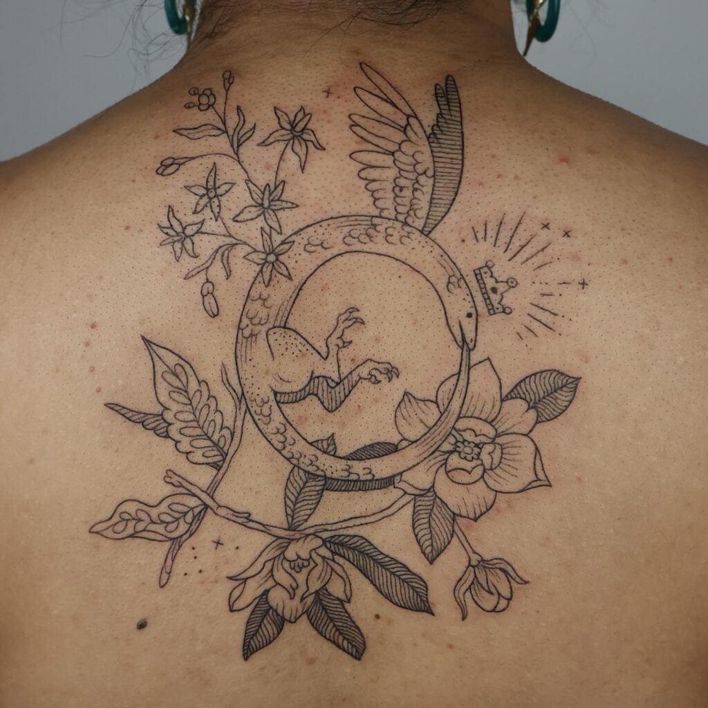 Mythical Ouroboros with Florals and Crown Tattoo Design