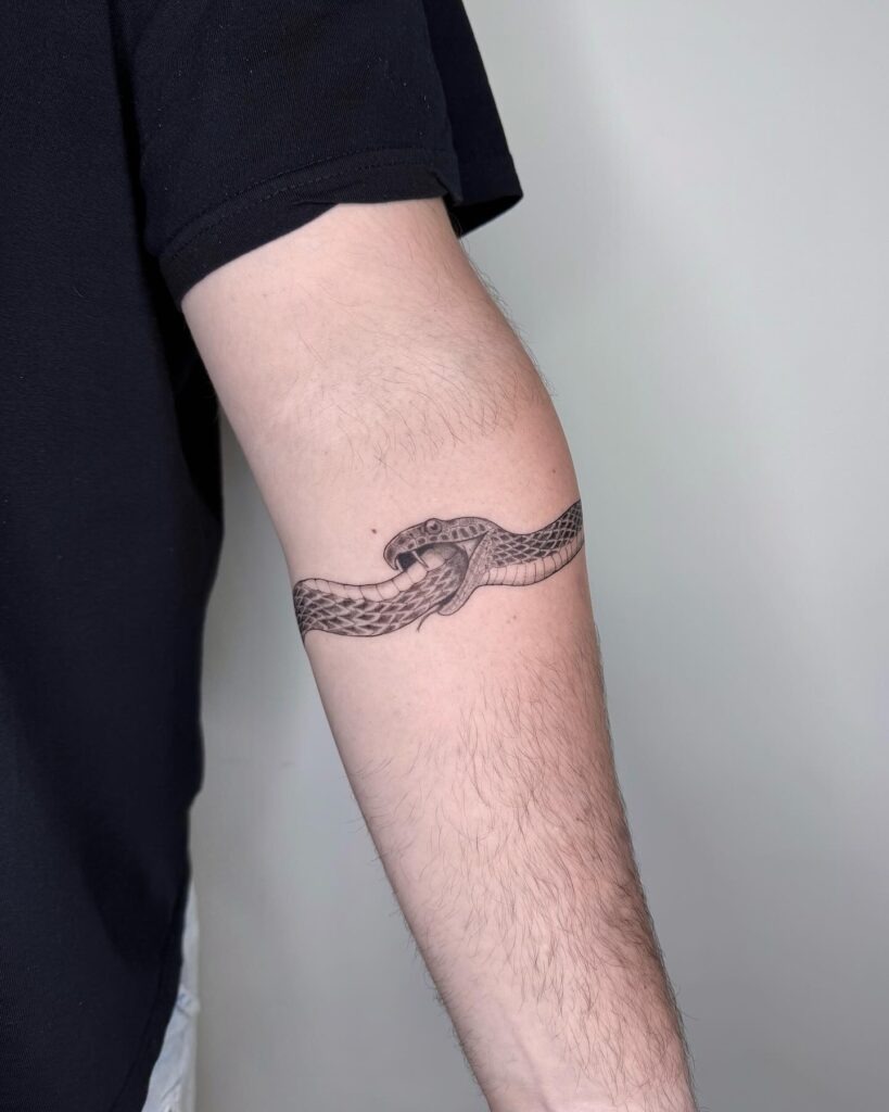Radiant Ouroboros with Sunburst Tattoo Tattoo Design