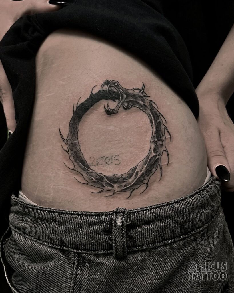 Spiked Ouroboros with Dark Detailing Tattoo Design