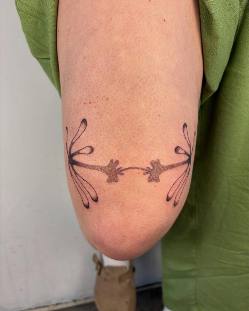 Abstract Floral Elbow Stick and Poke Tattoo Tattoo Design