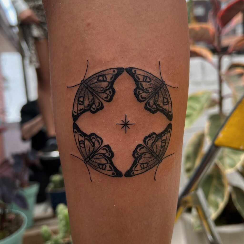 Butterfly Circle with Star Stick and Poke Tattoo Tattoo Design