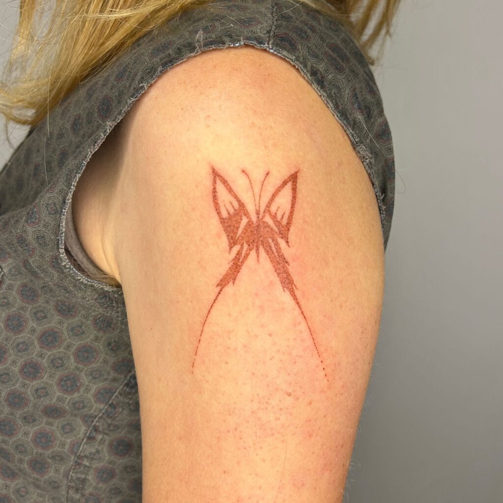 Sharp-Edged Red Butterfly Stick and Poke Tattoo Tattoo Design