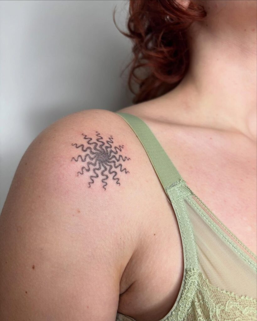 Wavy Starburst Shoulder Stick and Poke Tattoo Tattoo Design