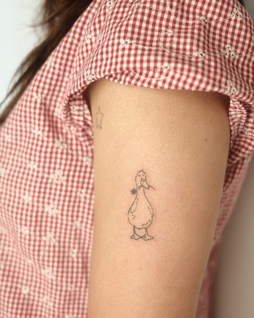 Whimsical Duck with Flower Stick and Poke Tattoo Tattoo Design