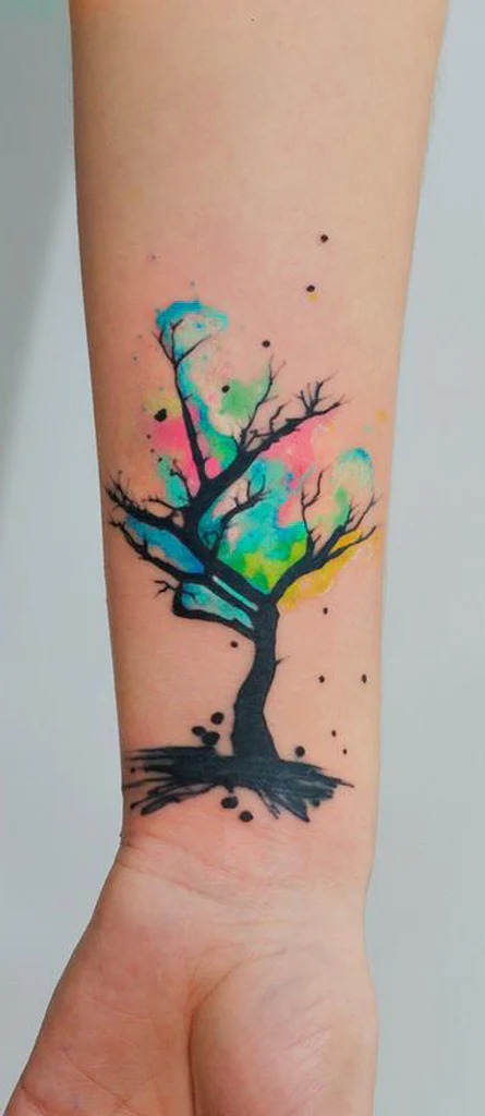 A more meaningful choice, the Tree of Life tattoo captures the essence of growth, connection, and the vibrancy of life through splashes of color.