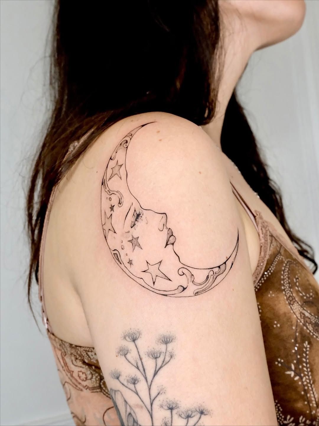 Elegant crescent moon ink with celestial details Tattoo Design