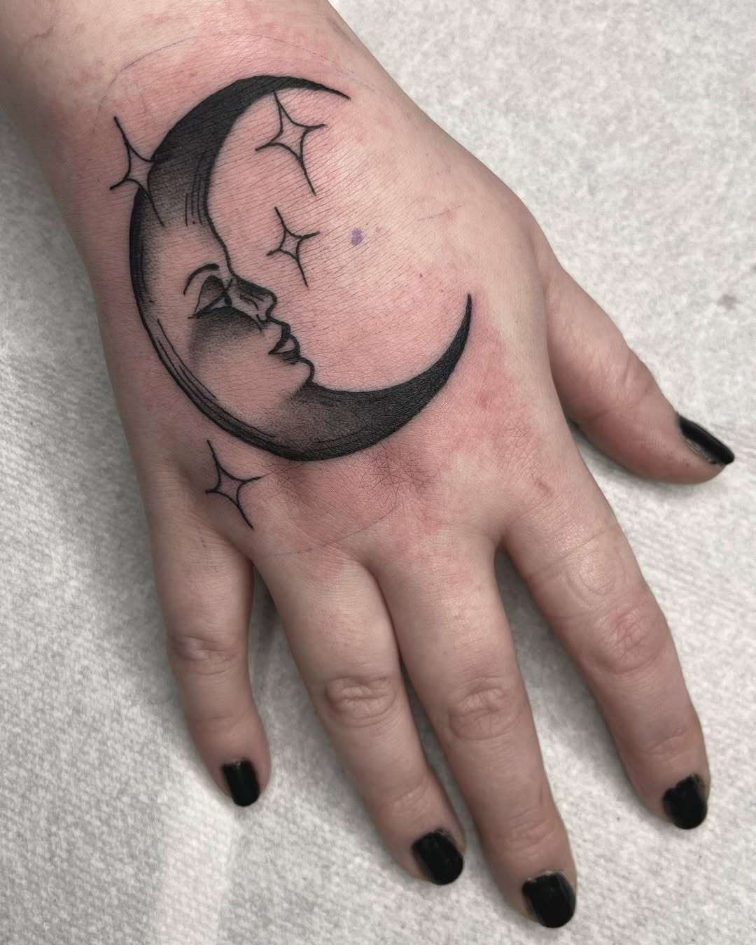 Elegant crescent moon with a feminine touch Tattoo Design