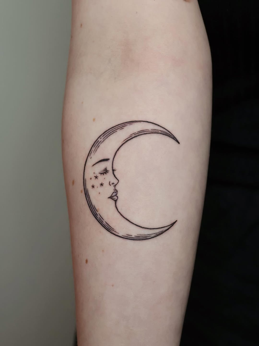 Elegant crescent moon with face and stars design. Tattoo Design