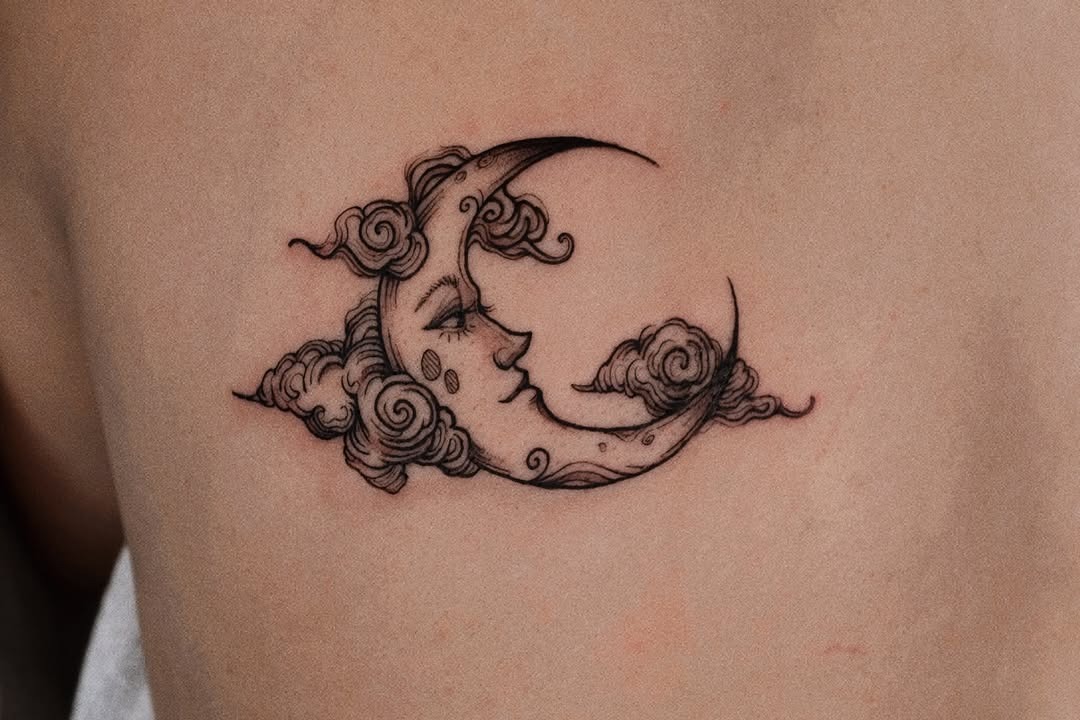 Elegant crescent moon with floral designs Tattoo Design