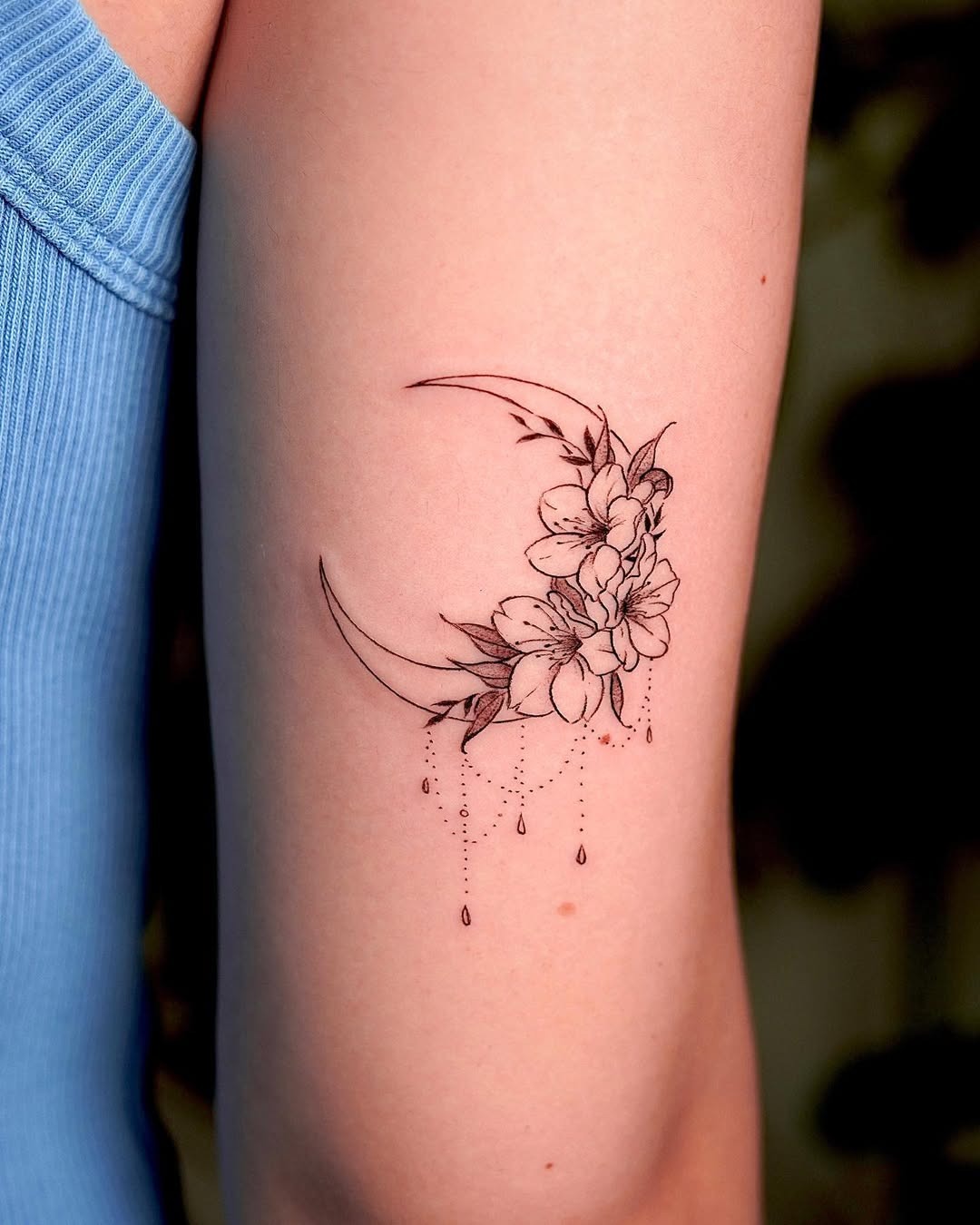 Elegant floral crescent moon tattoo design Tattoo Design