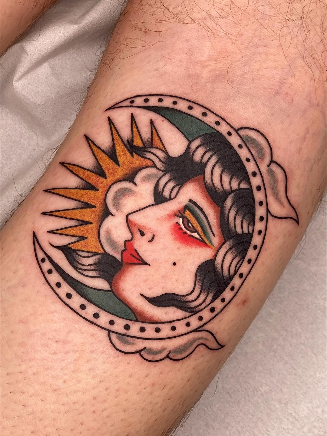 Stylish crescent moon with sun emblem tattoo Tattoo Design