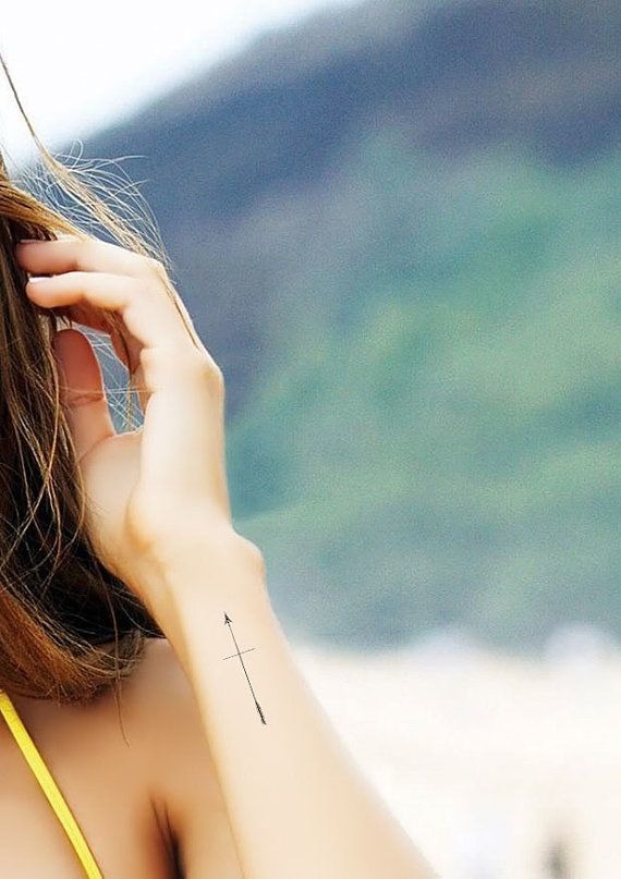Cross Arrow Tattoo on Side Wrist Tattoo Design
