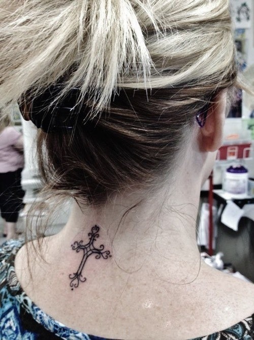 Detailed cross tattoo on girl’s neck Tattoo Design