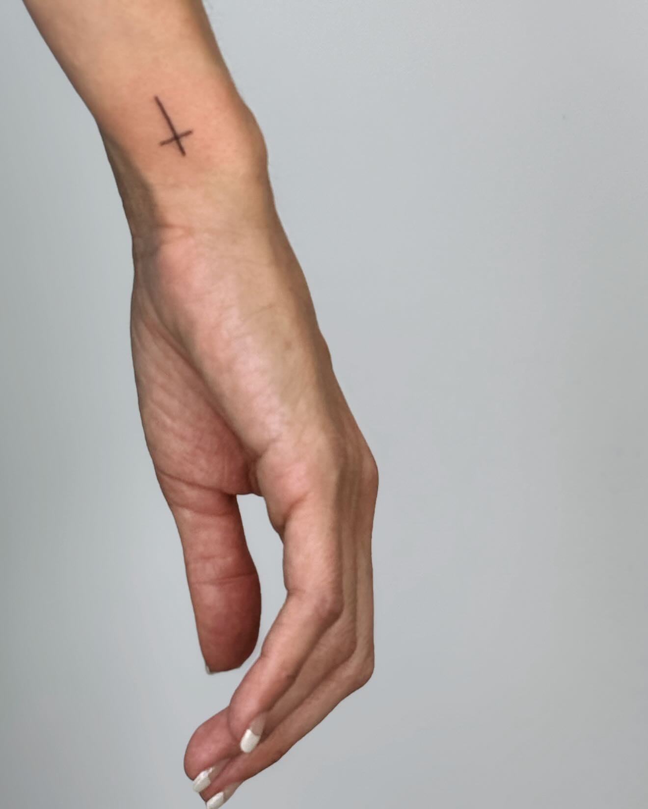 Minimal Wrist Cross Tattoo Tattoo Design