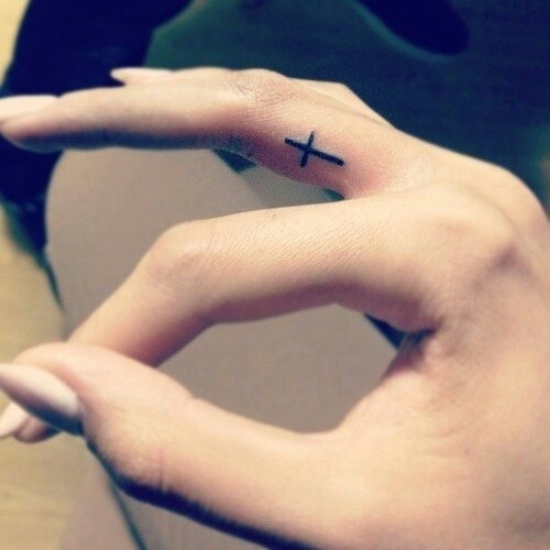 Tiny Cross Finger Tattoo Tattoo Design