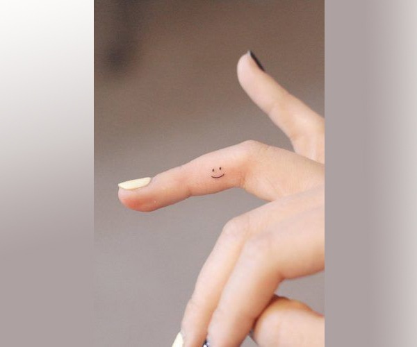 A Tattoo To Keep you Smiling Small Tattoos Tattoo Design