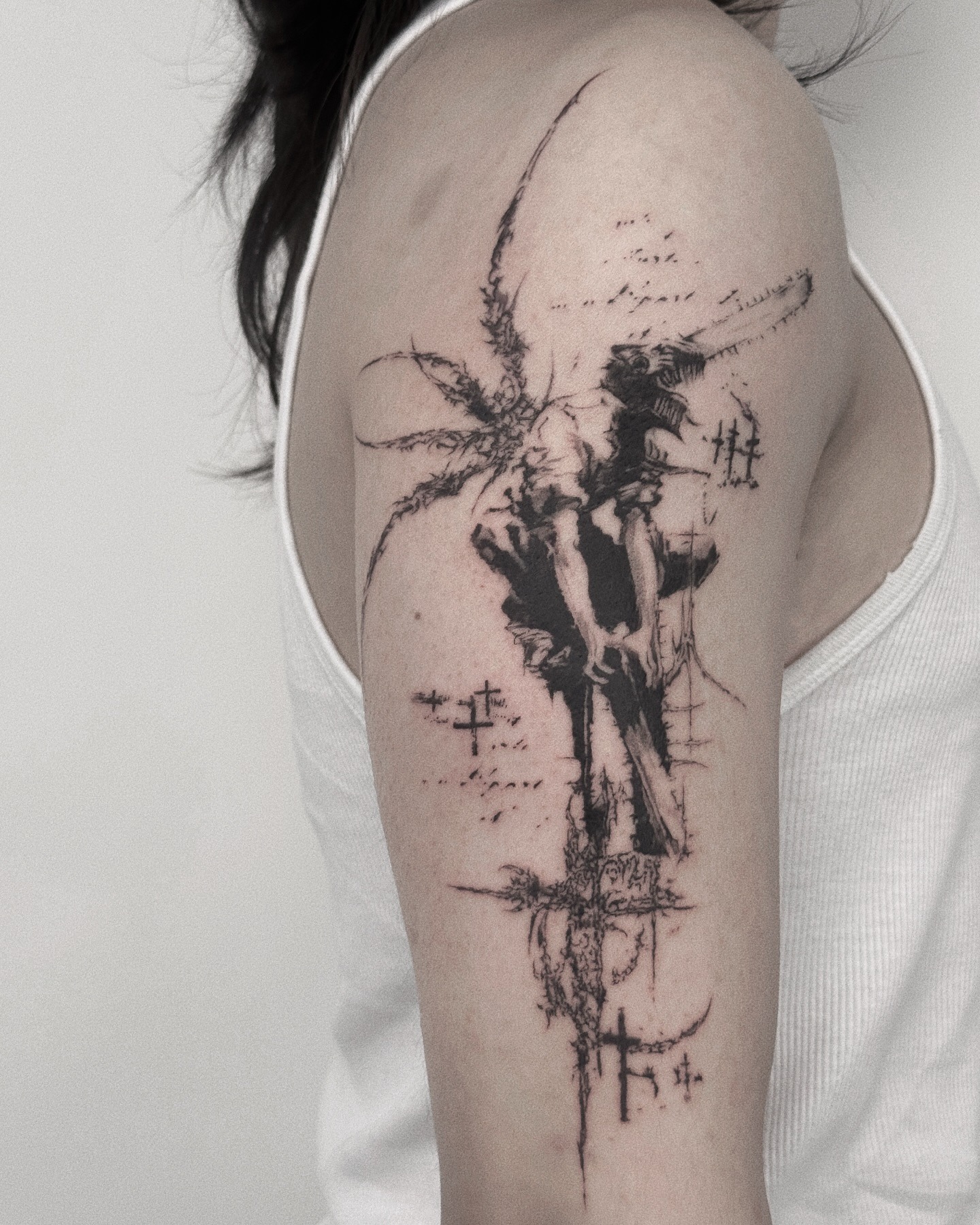 Dark angel cybersigilism tattoo with pointed mechanical wings and sharp barbed halo