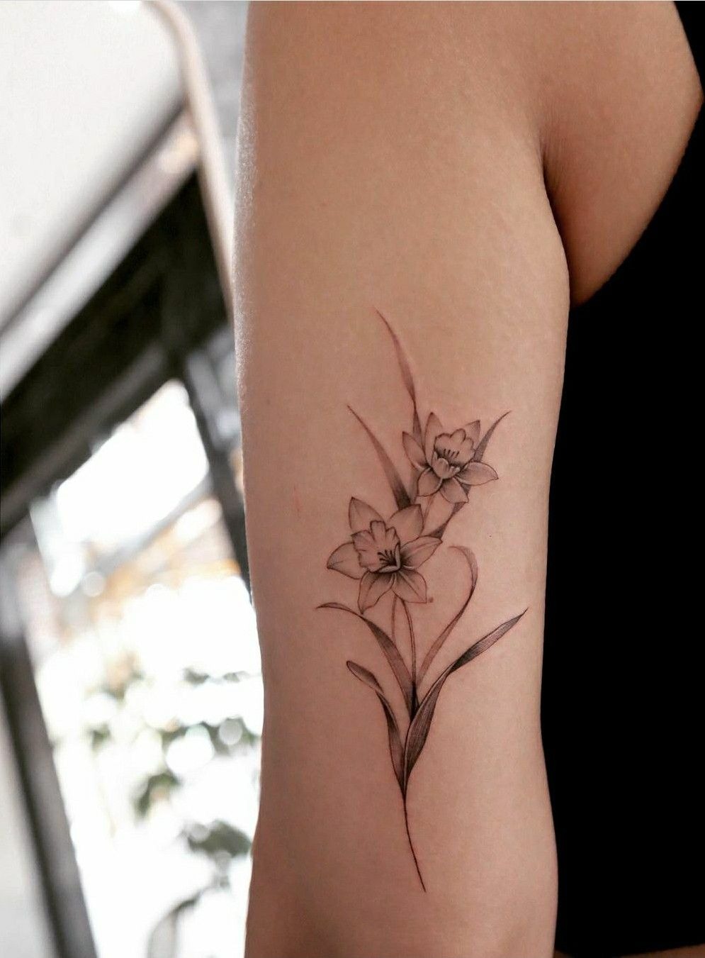 Fine Line Daffodil Pair on the Upper Arm Tattoo Design