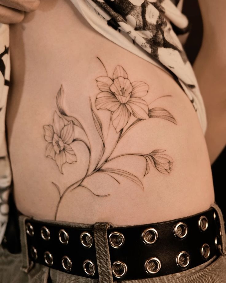 Flowing Fine Line Daffodils on the Side Tattoo Design