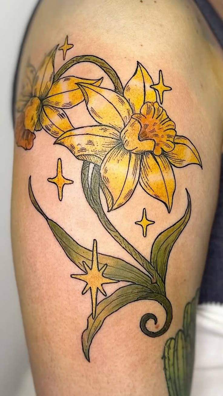Golden Daffodils With Whimsical Star Accents Tattoo Design