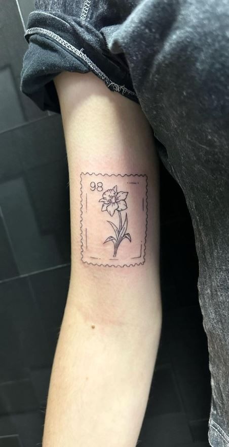 Minimal Daffodil Postage Stamp Outline Tattoo Design
