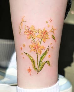 Whimsical Orange and Yellow Daffodil Tattoo Tattoo Design