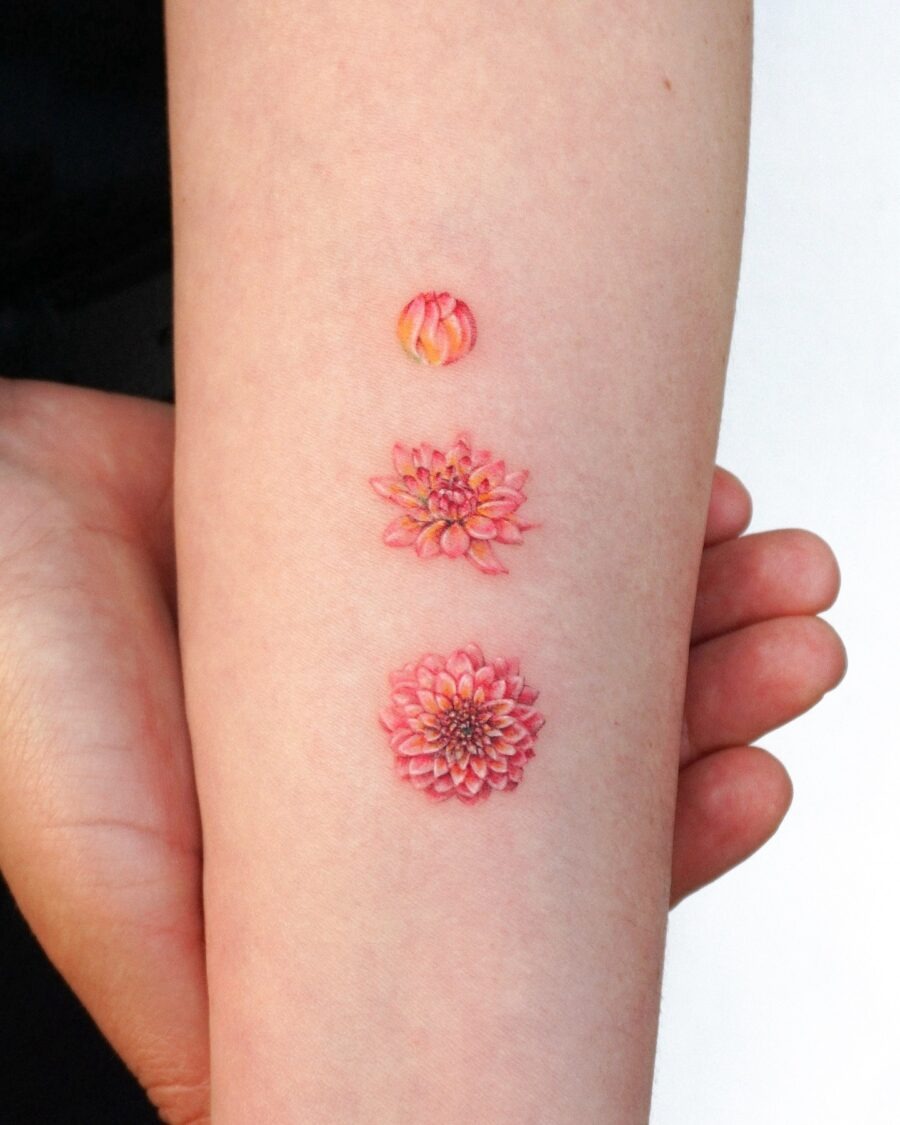 These dahlia tattoos showcase beautiful details and colors.