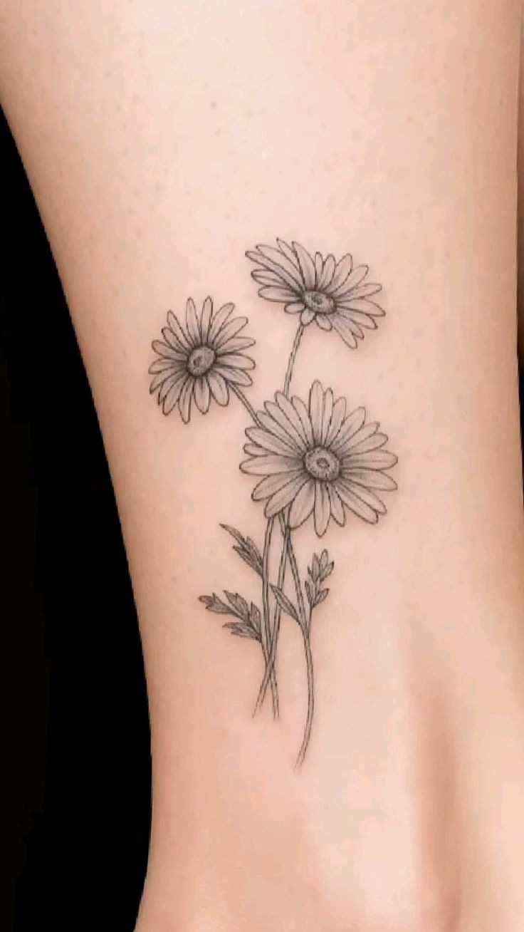 Simple Shoulder Daisy Bouquet Tattoo Design