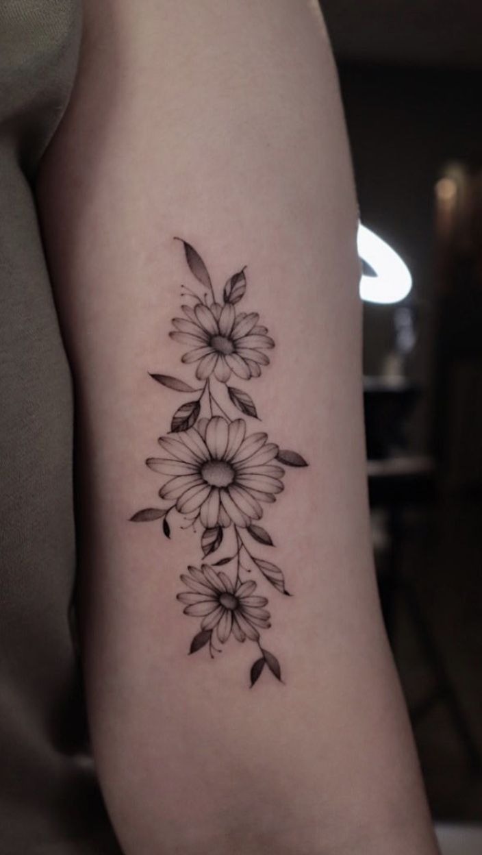 Vertical Daisy Trio Tattoo Design