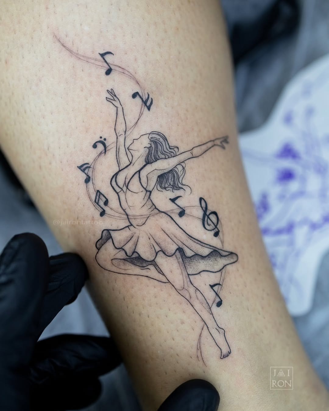 Elegant dancer inked in a musical flow Tattoo Design