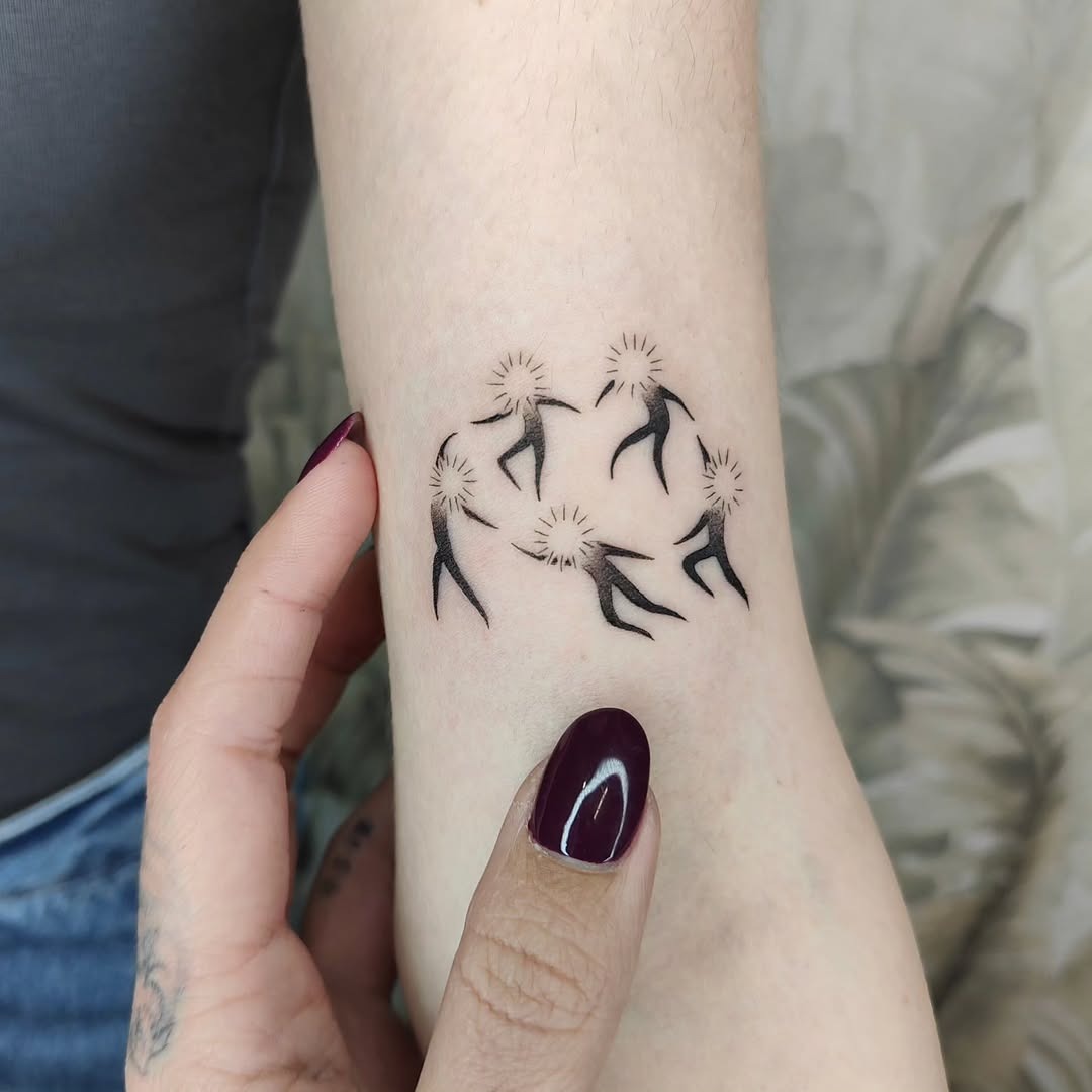 Elegant dancers forming a joyful circle tattoo Tattoo Design
