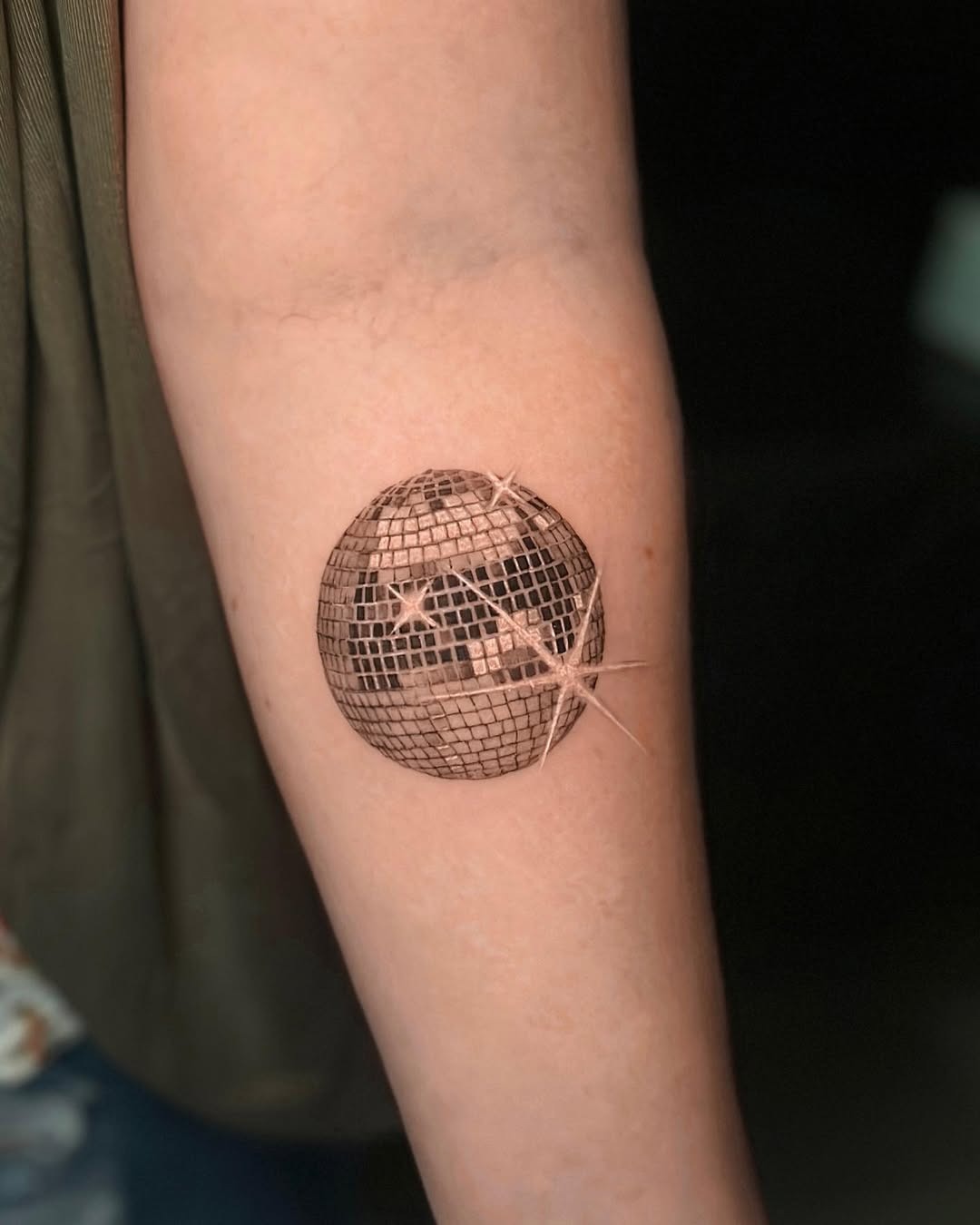 Stunning disco ball tattoo for dance lovers Tattoo Design