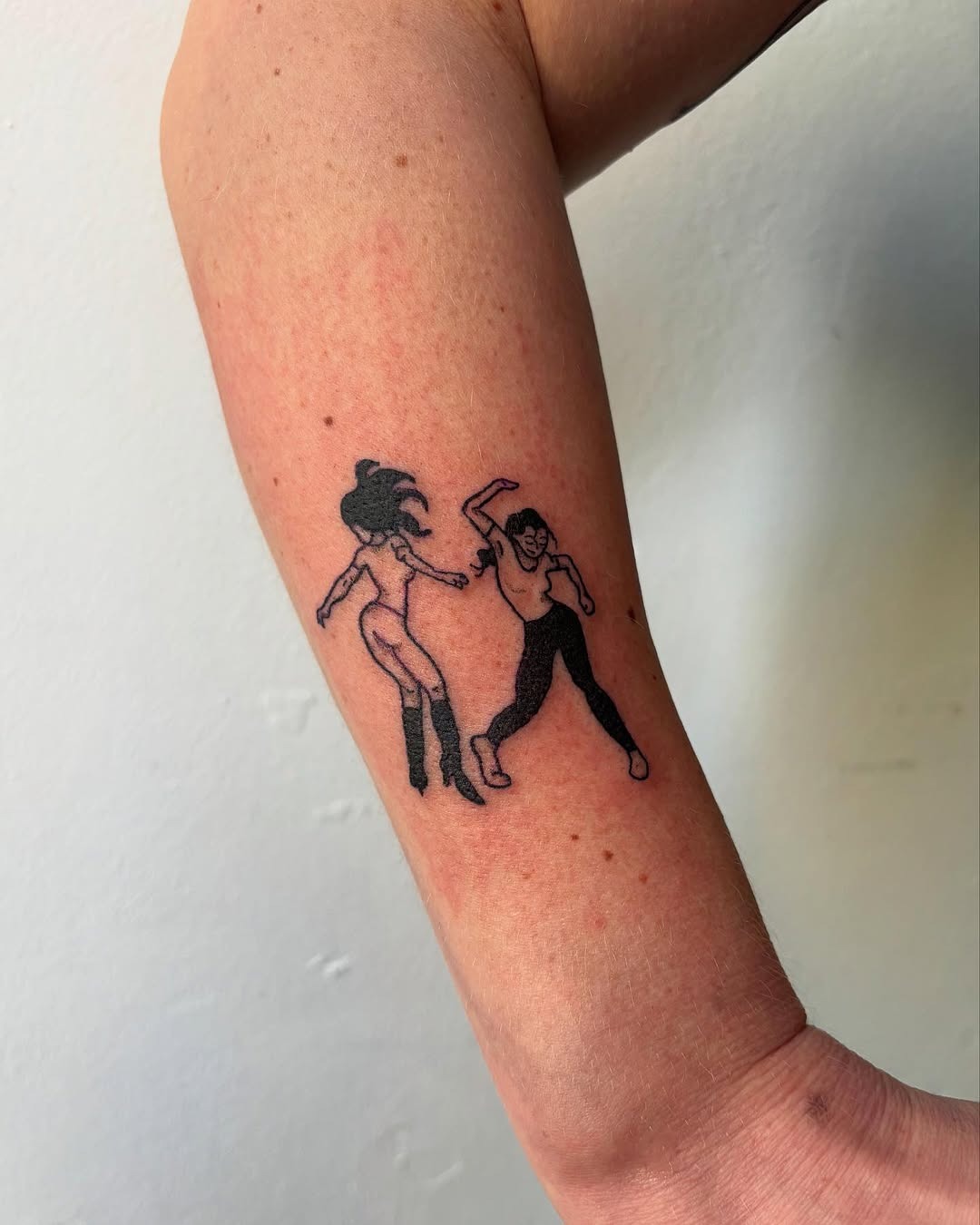 Stylish dance tattoos with vibrant movement Tattoo Design