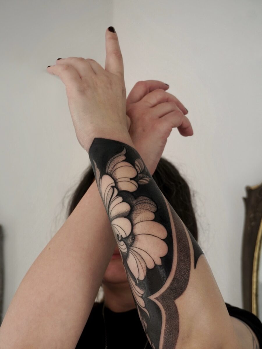 Bold floral tattoo exuding dark feminine vibes Tattoo Design