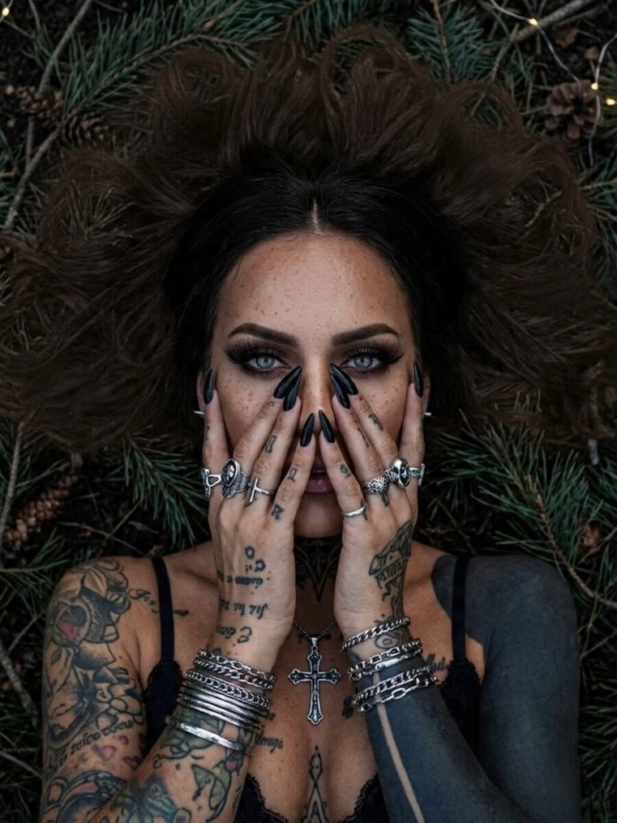 Captivating dark feminine tattoo artistry on display Tattoo Design