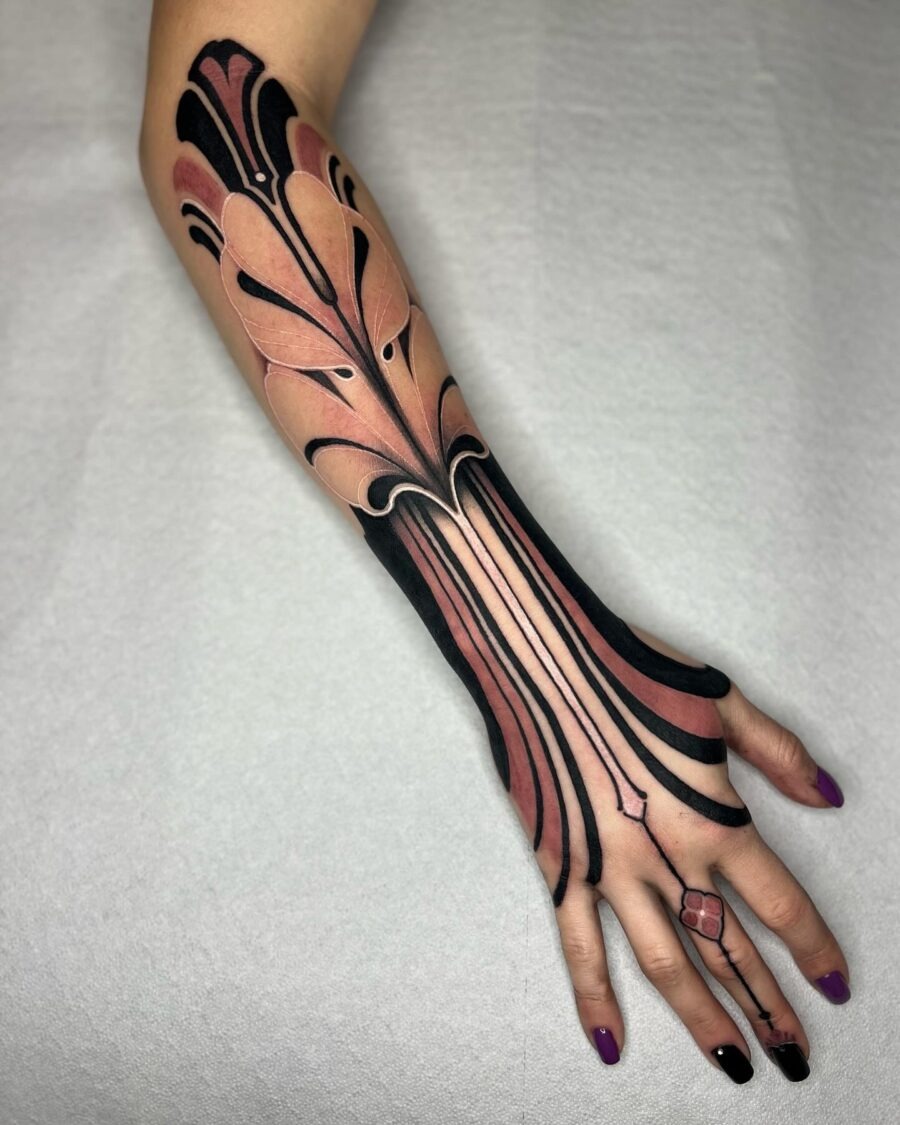 Elegant floral design adorns the arm Tattoo Design