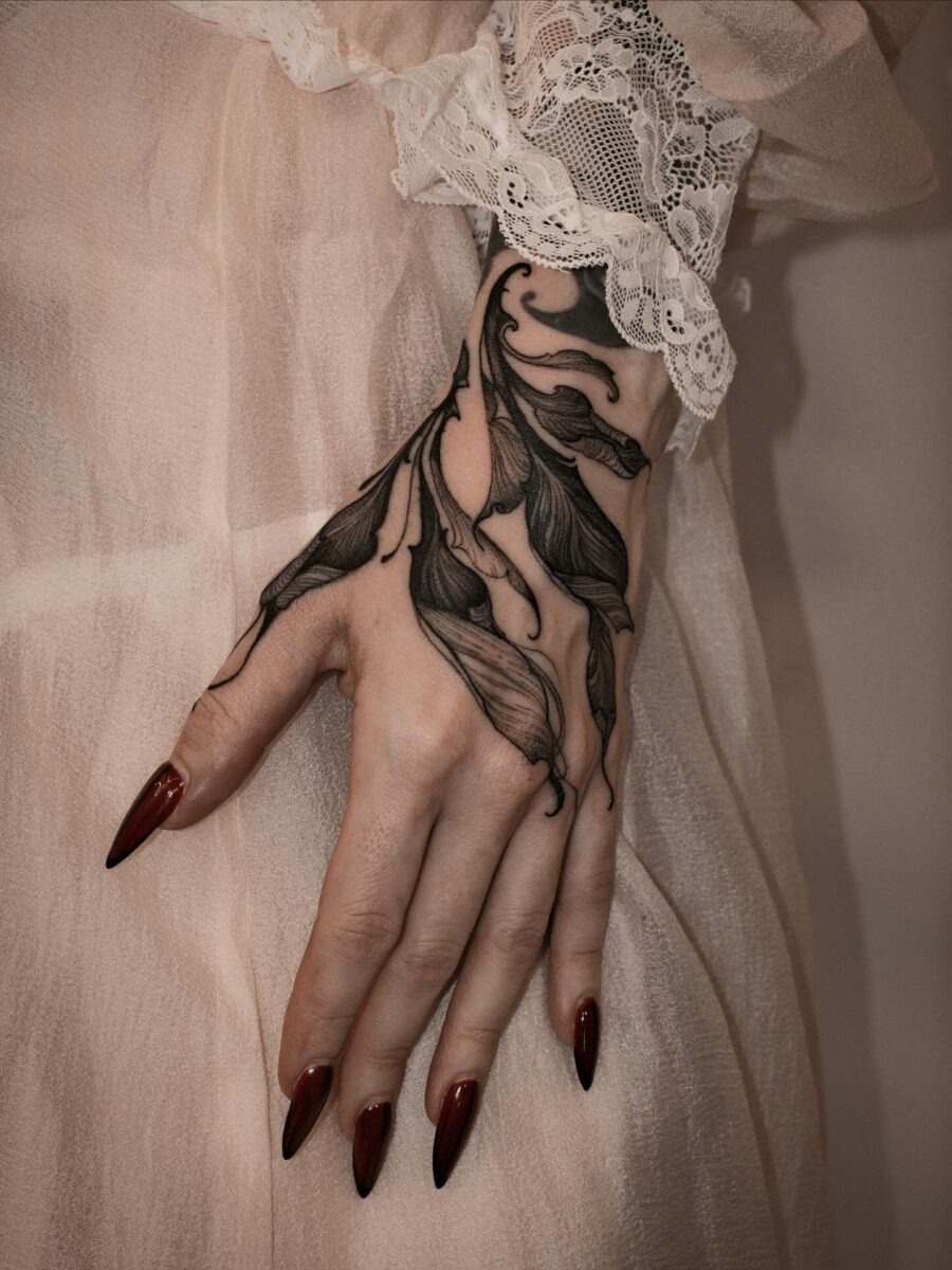 Elegant floral design on feminine hand tattoo Tattoo Design