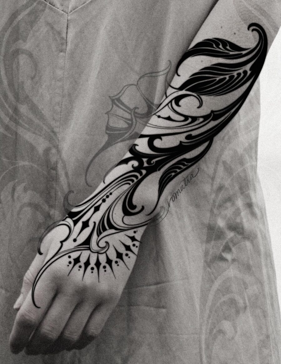 Elegant Swirls and Bold Black Ink Tattoo Design