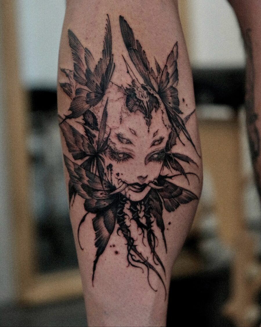 Intricate dark feminine tattoo with feathers Tattoo Design
