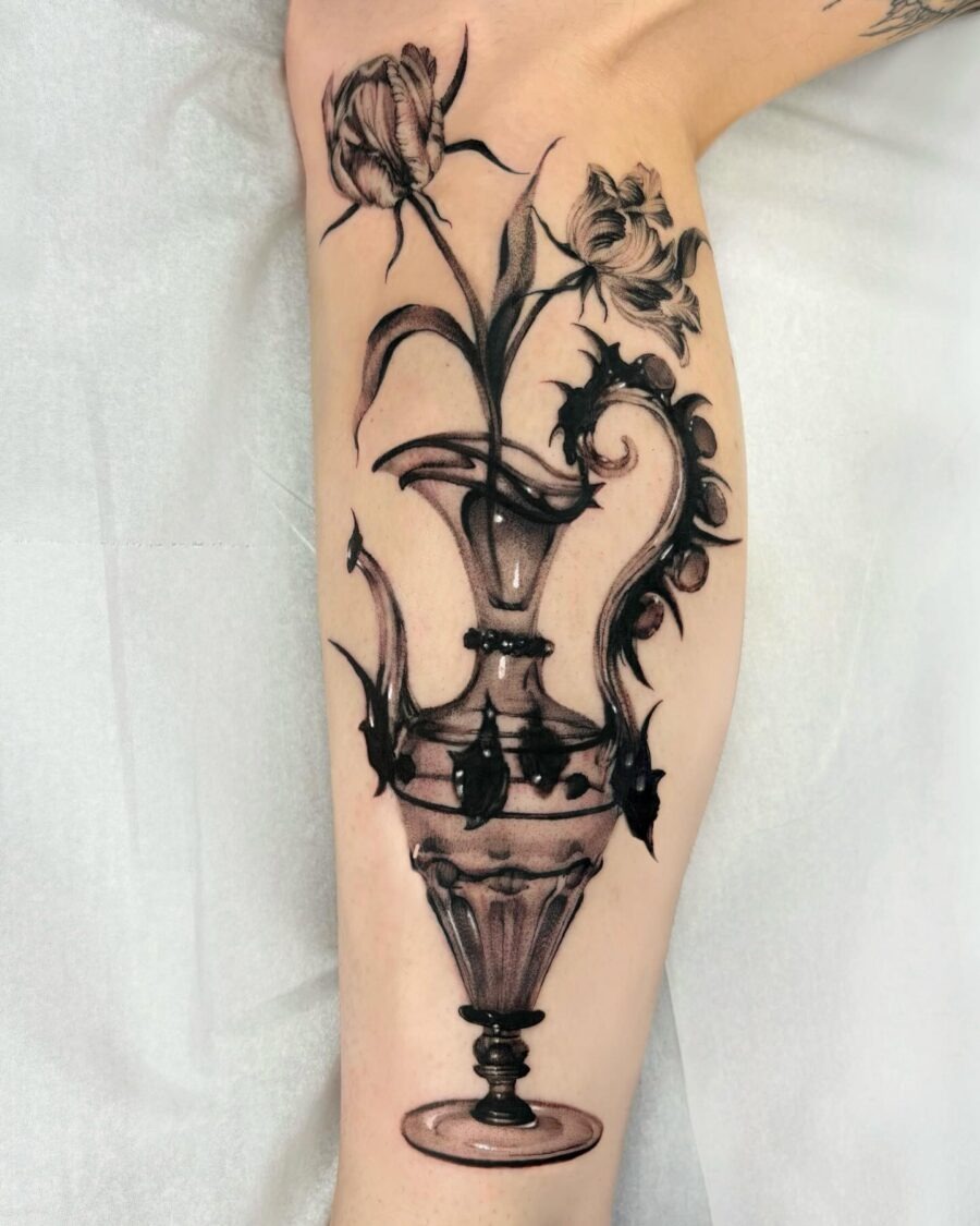 Intricate vase with blooming dark florals Tattoo Design