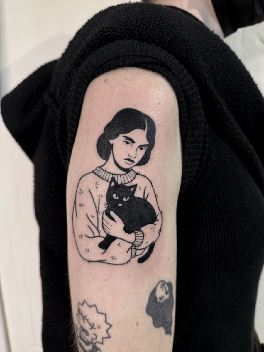 Intriguing woman with black cat tattoo Tattoo Design