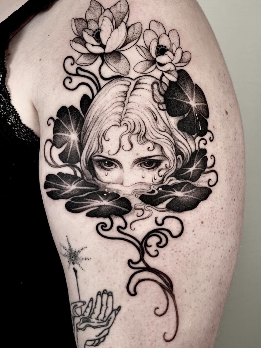 Mysterious feminine tattoo with floral elements Tattoo Design