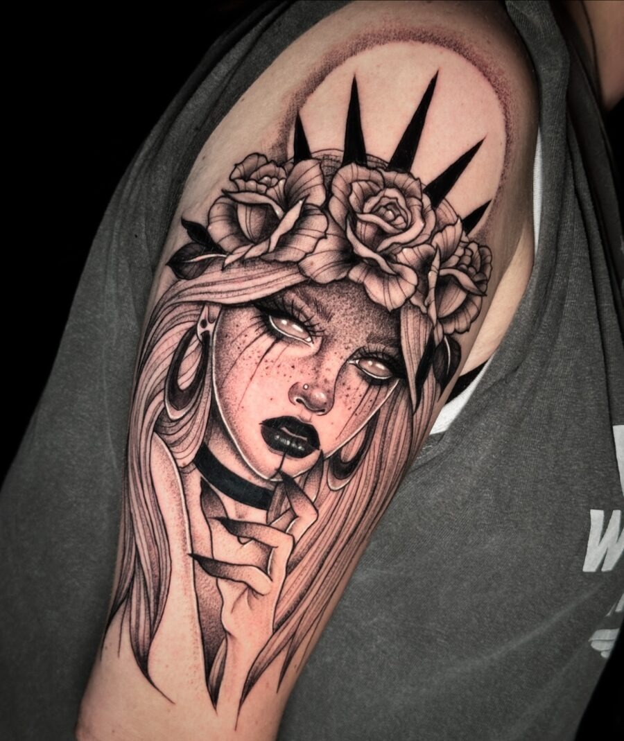Striking dark feminine tattoo with floral elements Tattoo Design