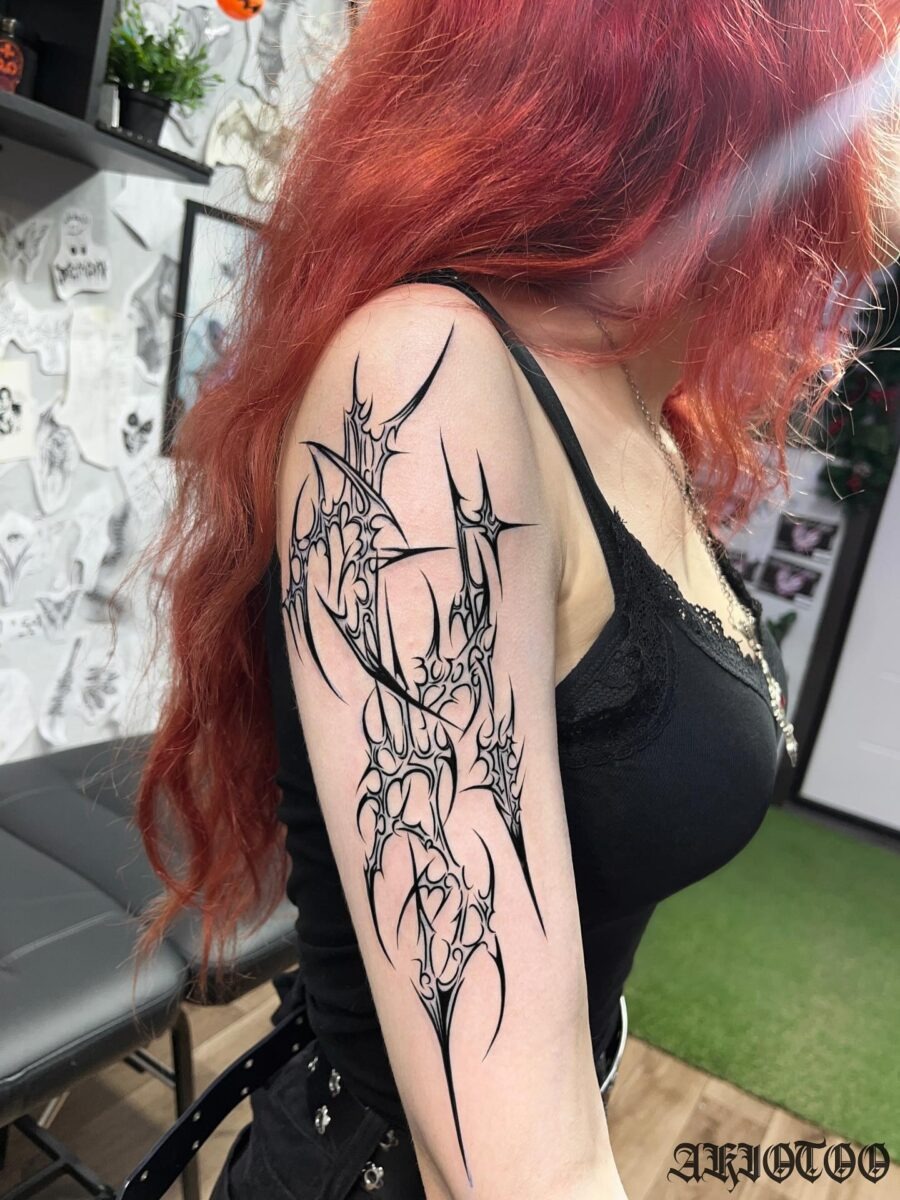 Striking dark feminine tattoo with intricate details Tattoo Design