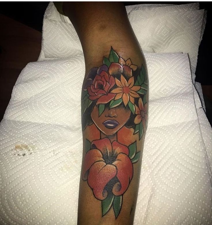 Bold Floral Crown Tattoo on the Forearm Tattoo Design