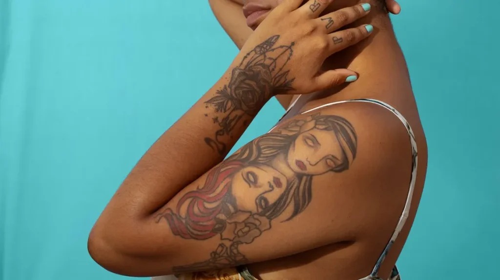 Feminine Floral and Celestial Blend on the Arm Tattoo Design